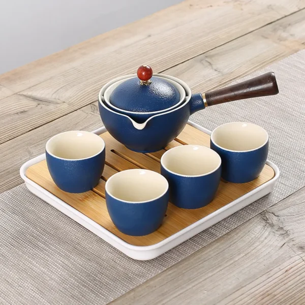 ⁦Porcelain Chinese Kung Fu Tea Set Portable Gift Bag Package Teapot Set with 360 Rotation Tea Maker and Infuser⁩ - الصورة ⁦3⁩