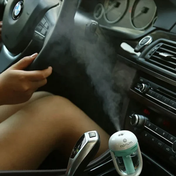 ⁦12V Car air Freshener Oil Diffuser Car Steam Air Humidifier Aroma Diffuser Mini Air Purifier Diffuser Mist Maker Fogger⁩ - الصورة ⁦3⁩