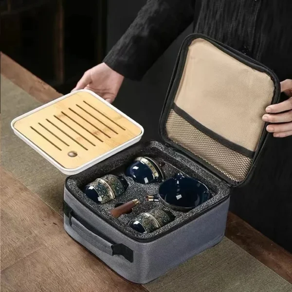 ⁦Porcelain Chinese Kung Fu Tea Set Portable Gift Bag Package Teapot Set with 360 Rotation Tea Maker and Infuser⁩ - الصورة ⁦2⁩